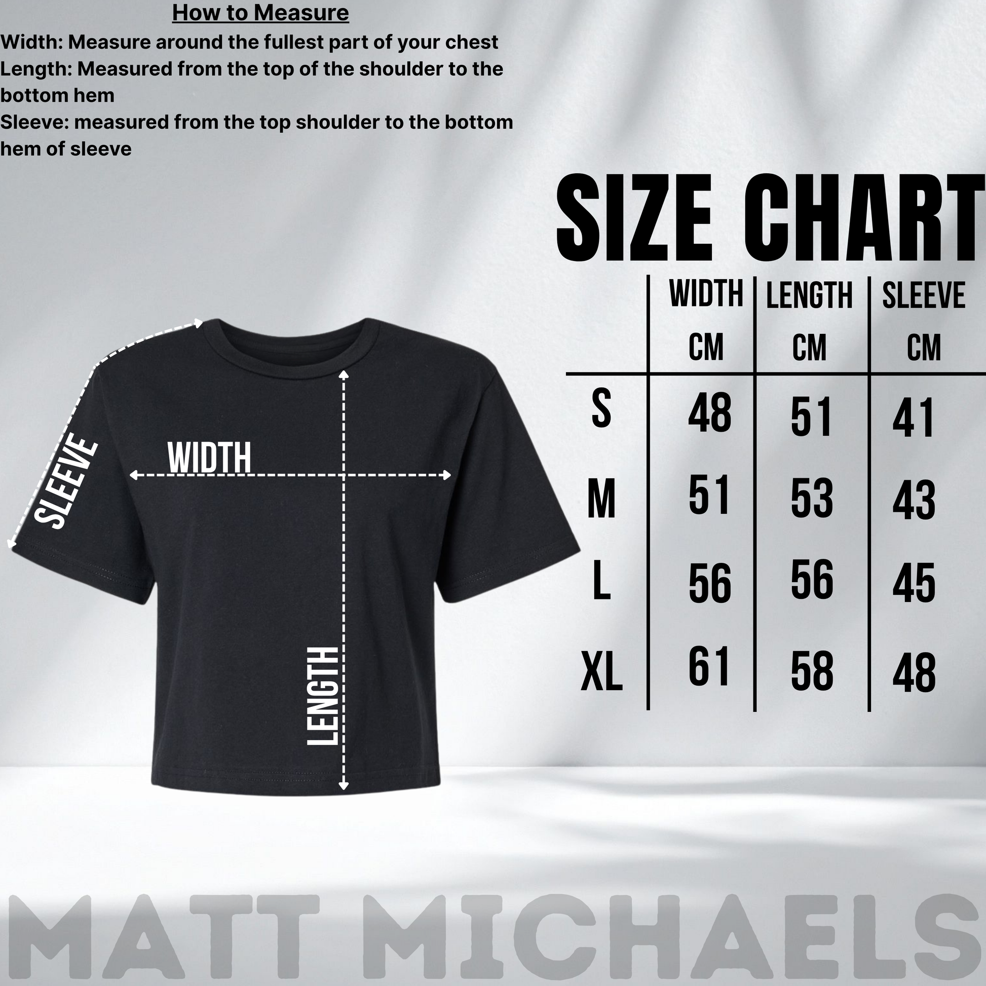 Black t-shirt with size chart and measurement guide on a gray background