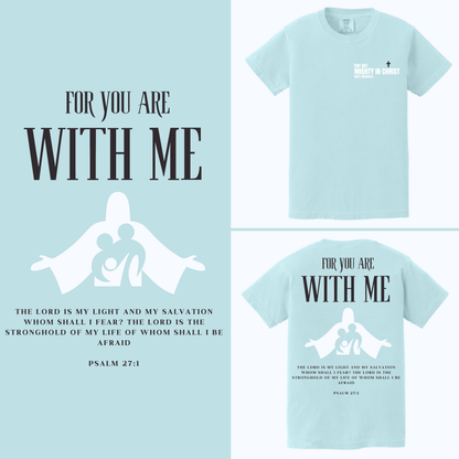 Light blue t-shirt with religious text and graphics on a light blue background