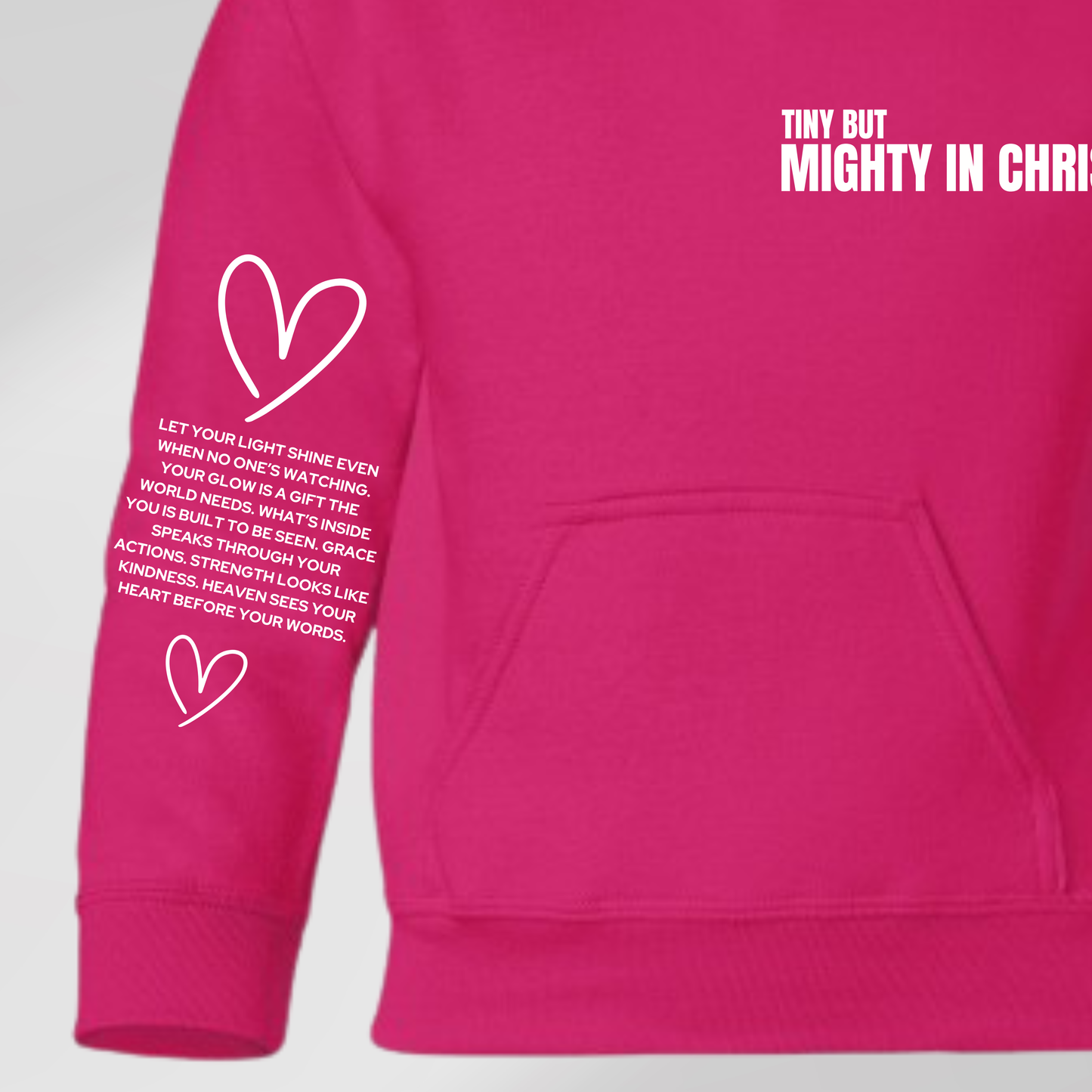 Pink hoodie with white text and hearts on a light gray background